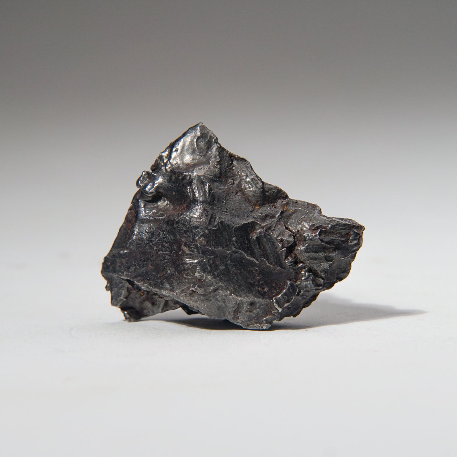 Genuine Sikhote-Alin Meteorite on Acrylic Stand (87.7 grams)