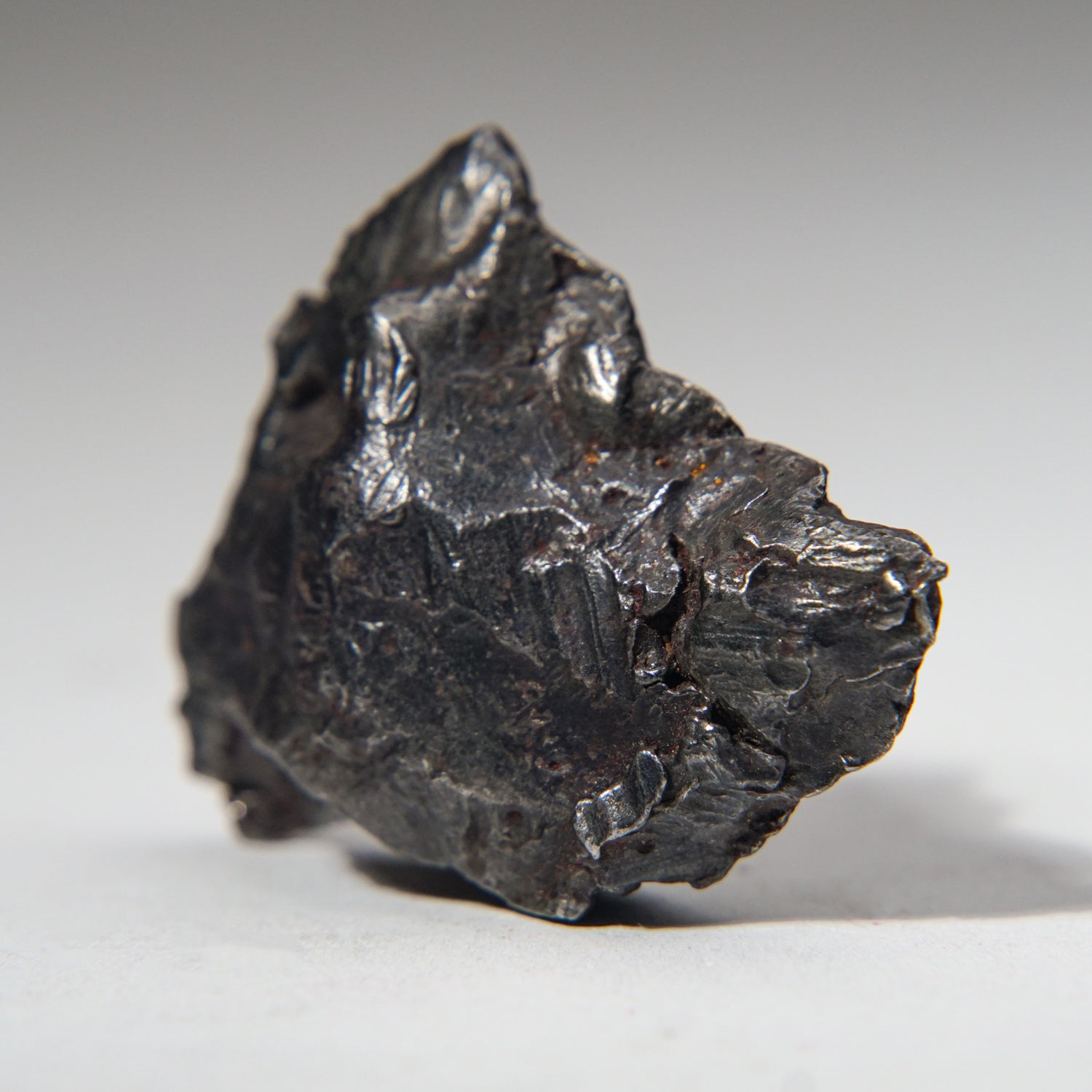 Genuine Sikhote-Alin Meteorite on Acrylic Stand (87.7 grams)