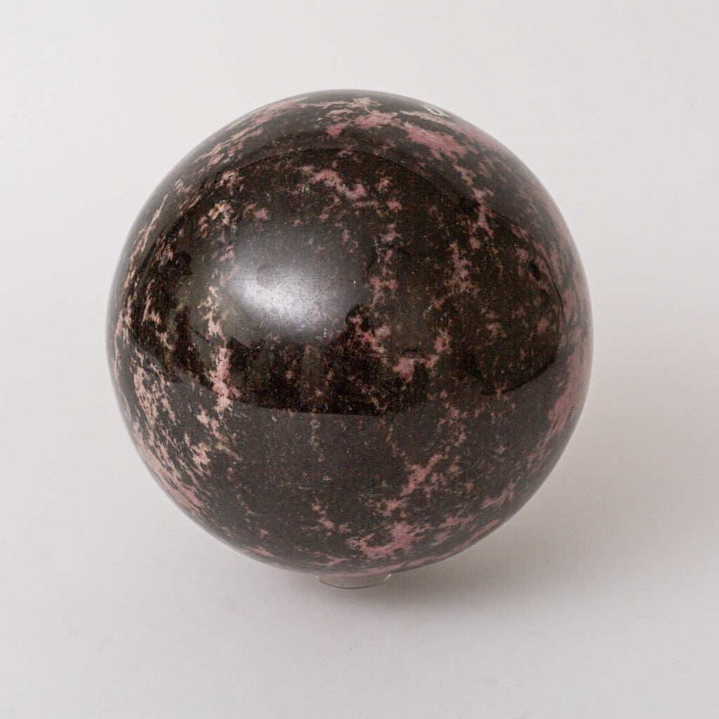 Polished Imperial Rhodonite Sphere from Madagascar (23.5 lbs)