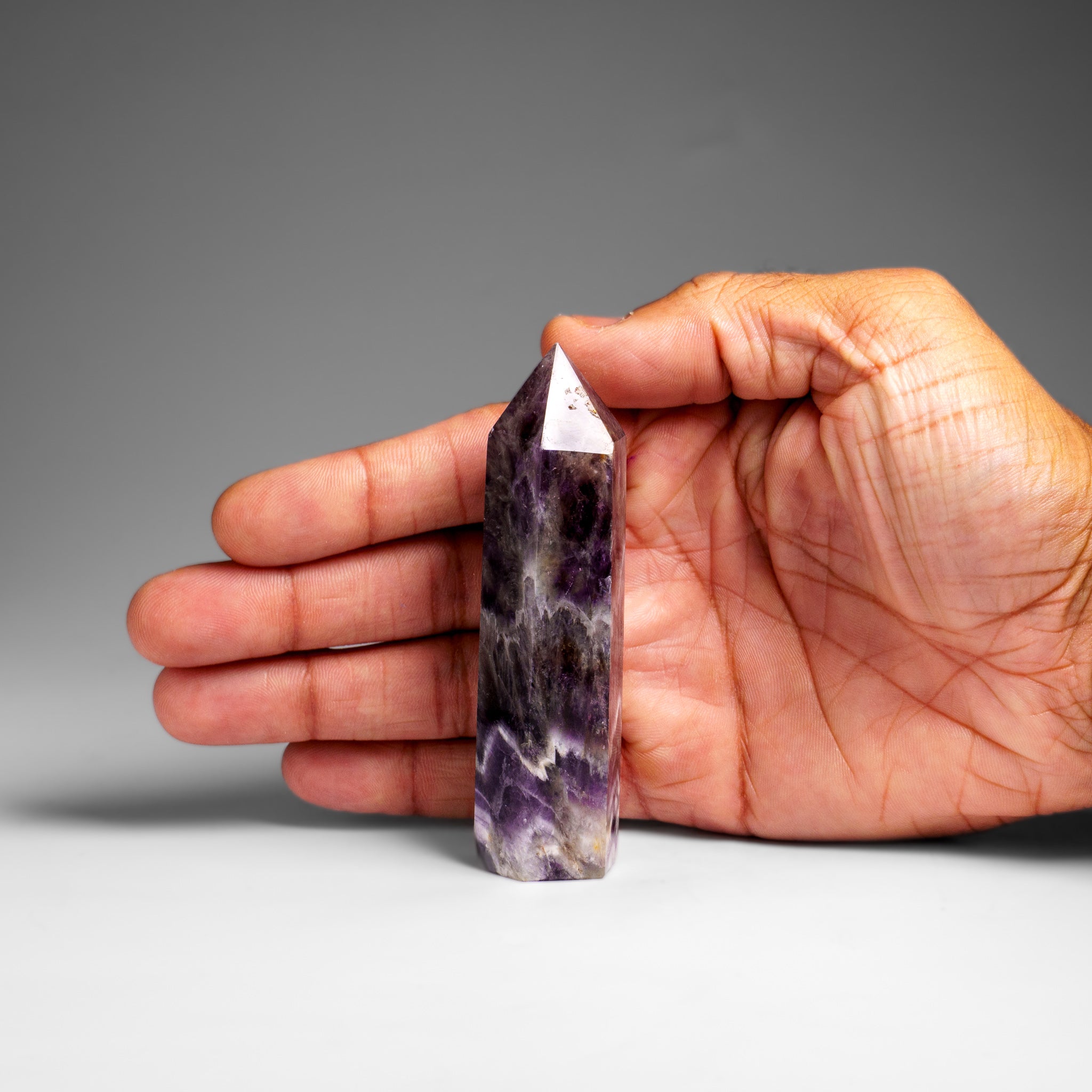 Polished Chevron Amethyst Point from Brazil (91.8 grams)