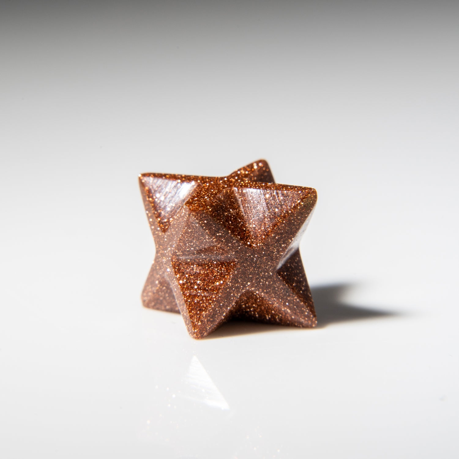 Genuine Polished Red Goldstone Merkaba Star with black velvet pouch