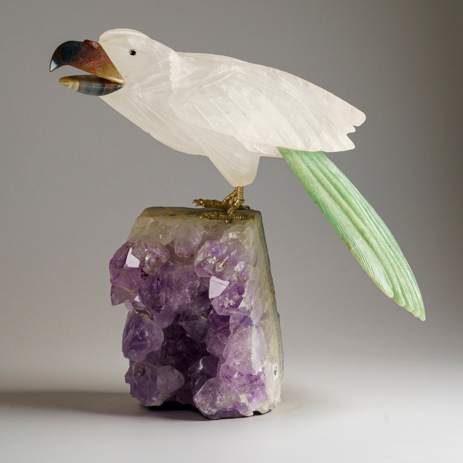 Polished Hand Carved Bird on a Amethyst Cluster Matrix