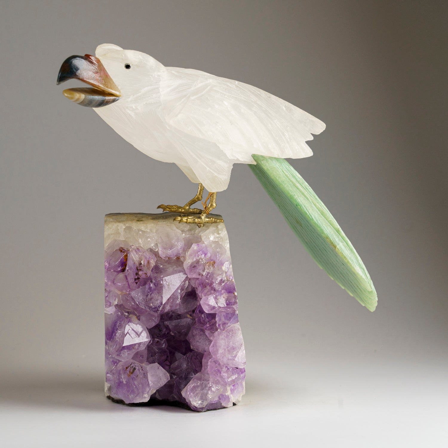 Polished Hand Carved Bird on a Amethyst Cluster Matrix