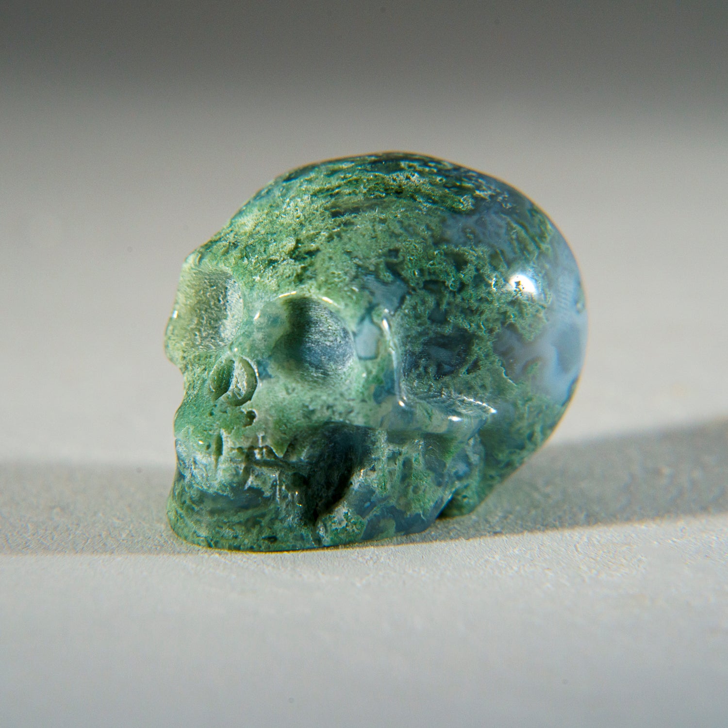 Polished Green Moss Agate Skull Carving (25 grams)