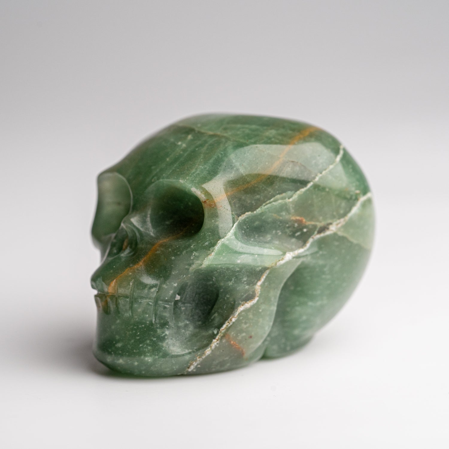 Polished Green Aventurine Skull Carving (134.5 grams)