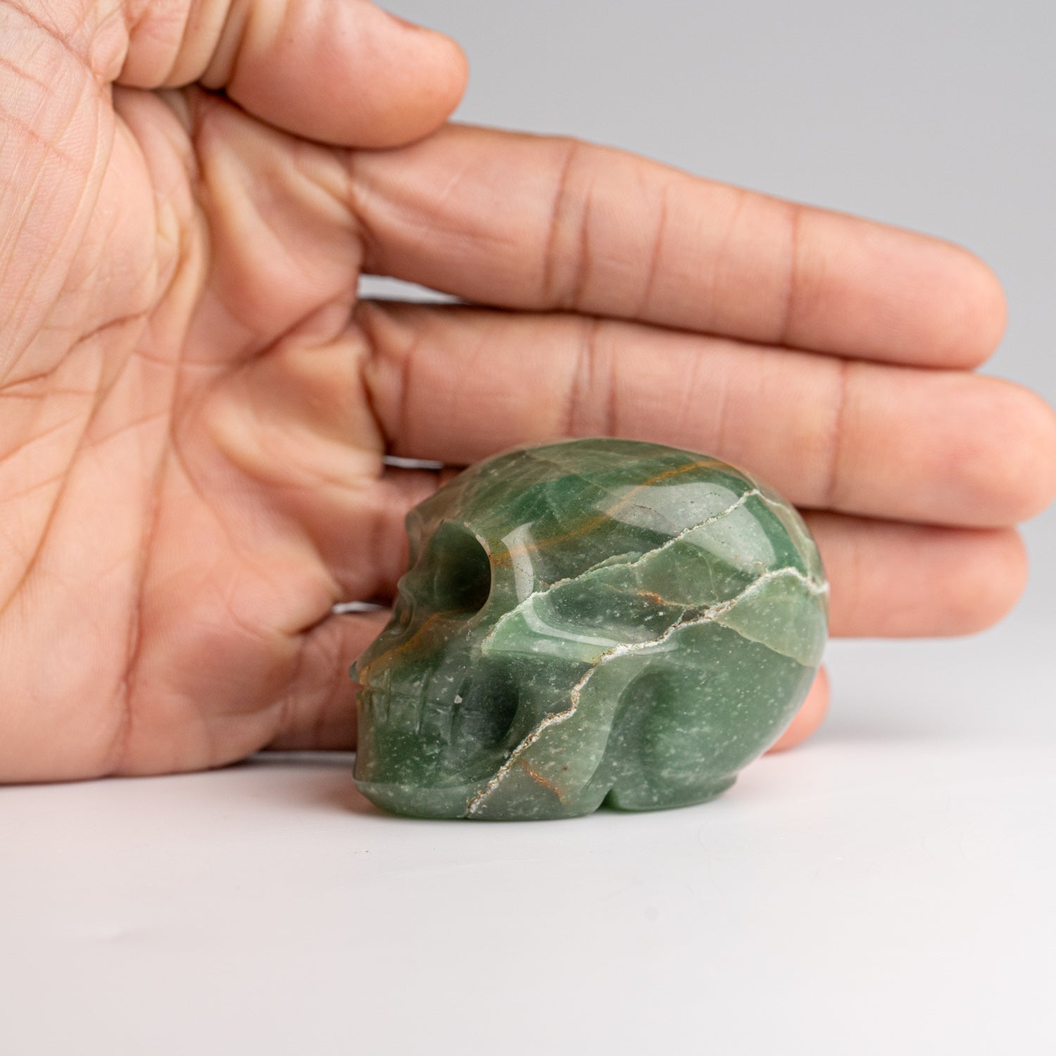 Polished Green Aventurine Skull Carving (134.5 grams)