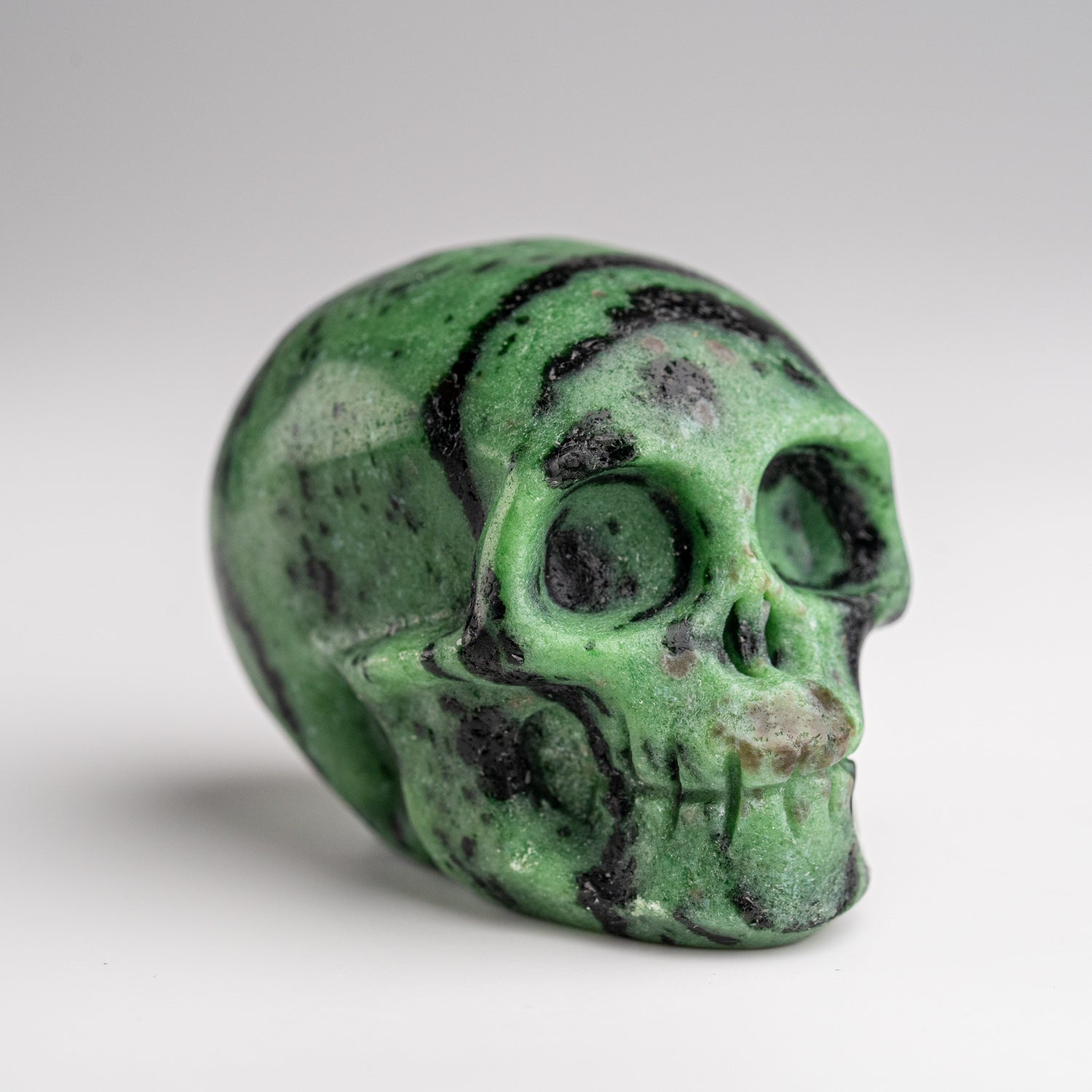 Polished Zoisite Skull Carving (153.2 grams)