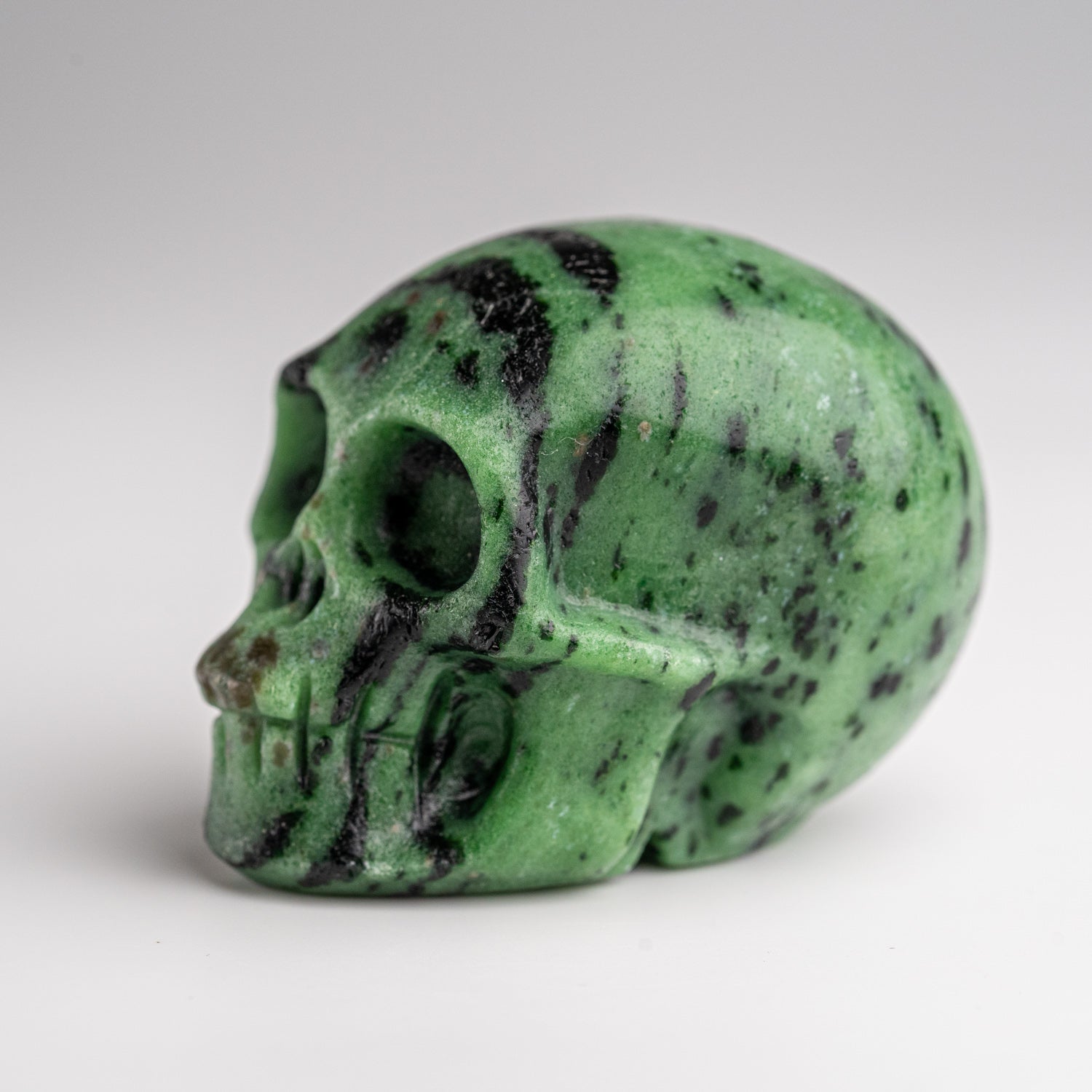 Polished Zoisite Skull Carving (153.2 grams)