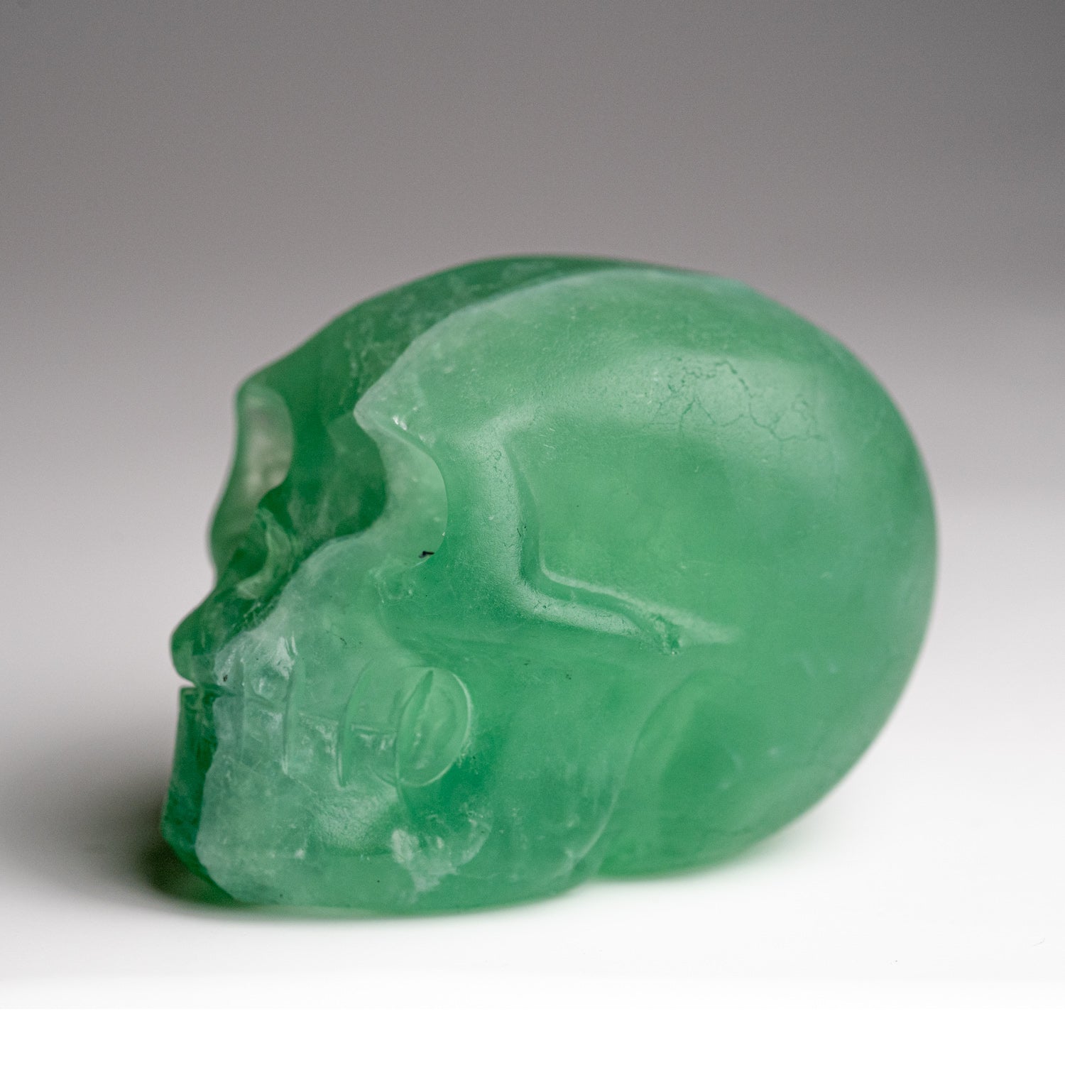 Polished Green Fluorite Skull Carving (168.6 grams)