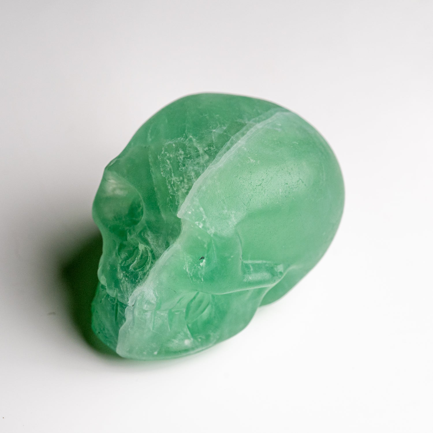 Polished Green Fluorite Skull Carving (168.6 grams)