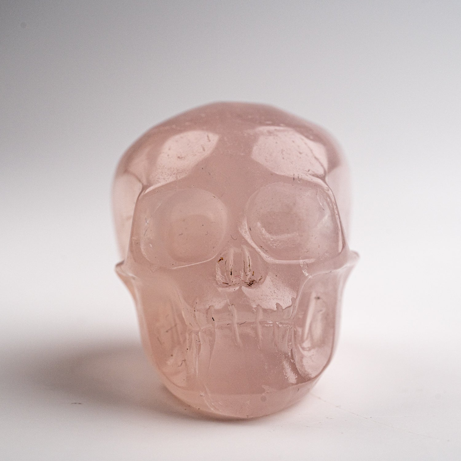 Polished Rose Quartz Skull Carving (120 grams)