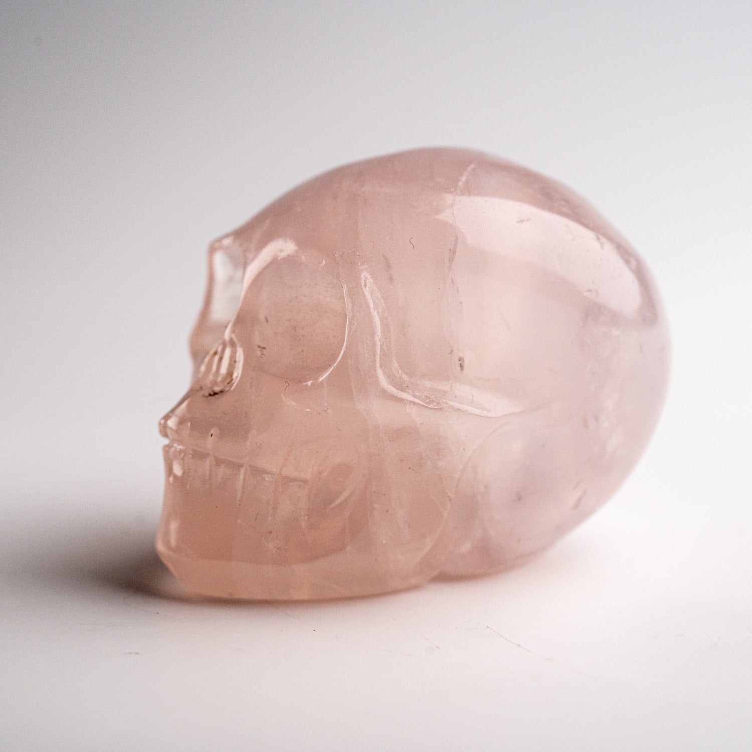 Polished Rose Quartz Skull Carving (120 grams)