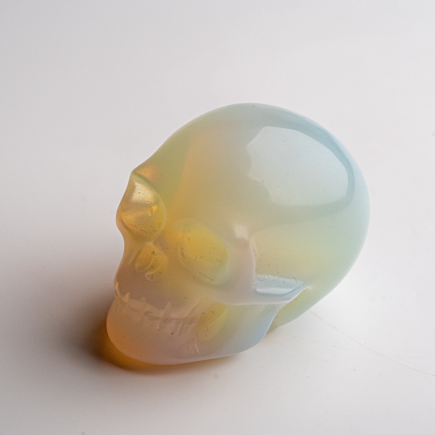 Polished Opalite Skull Carving (129.4 grams)