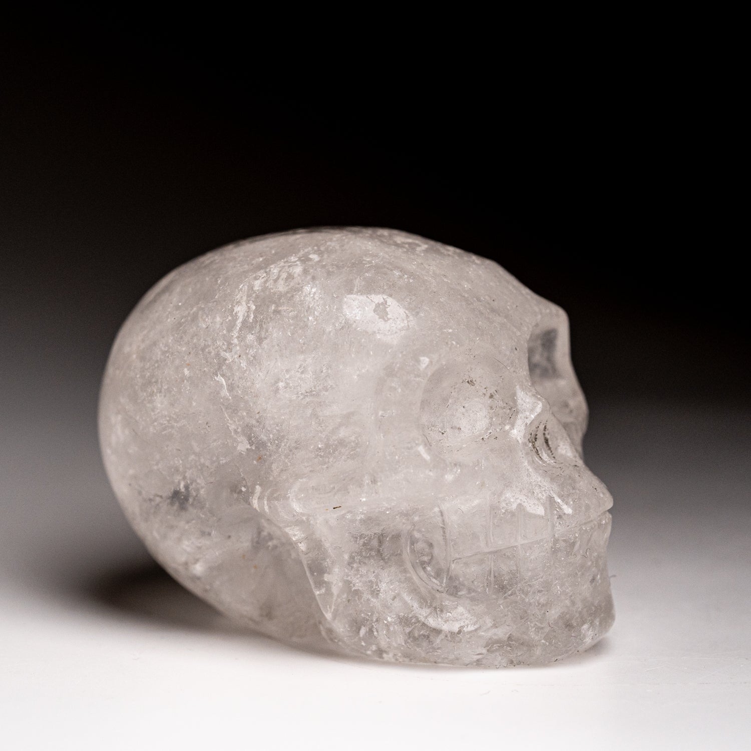 Polished Quartz Skull Carving (129 grams)