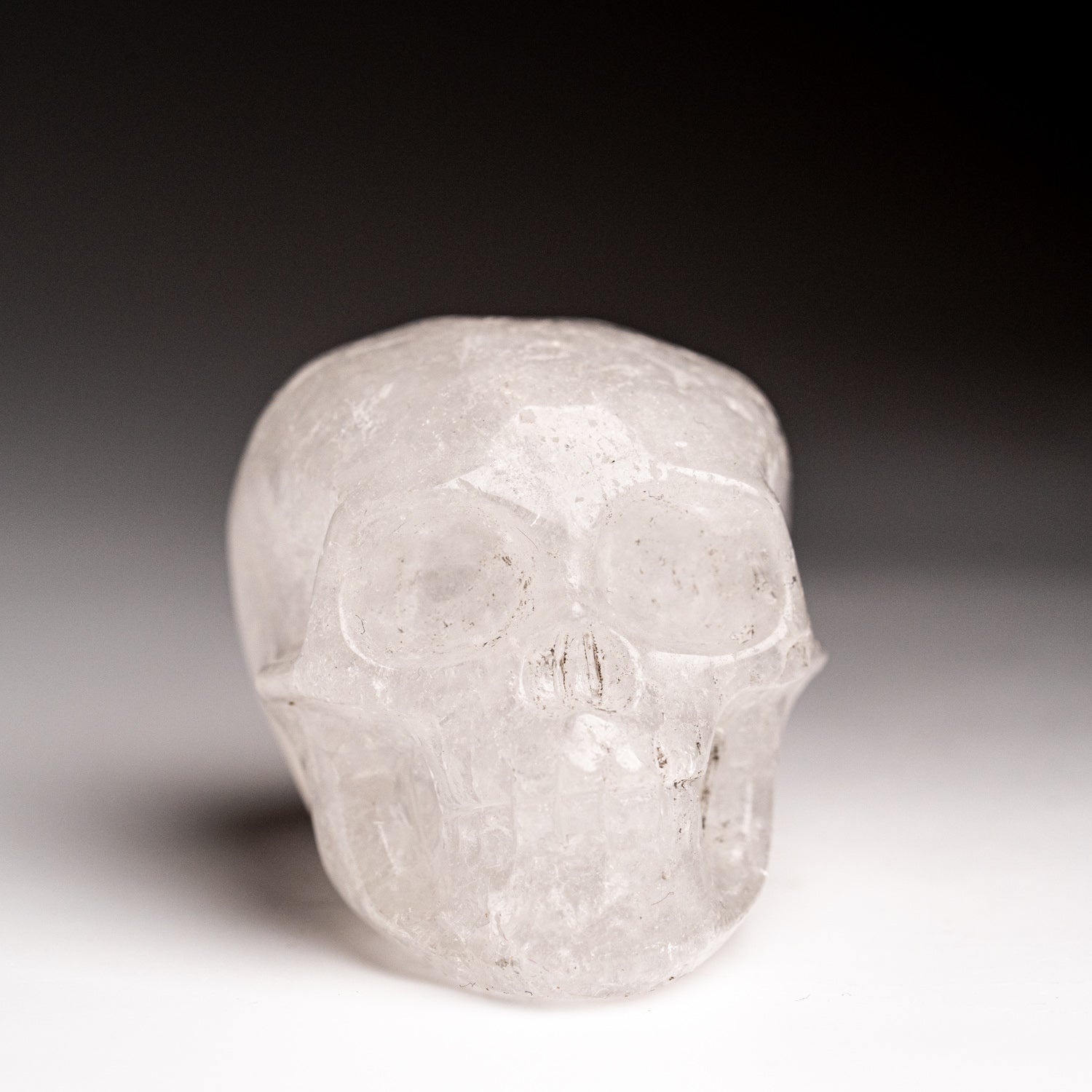 Polished Quartz Skull Carving (129 grams)