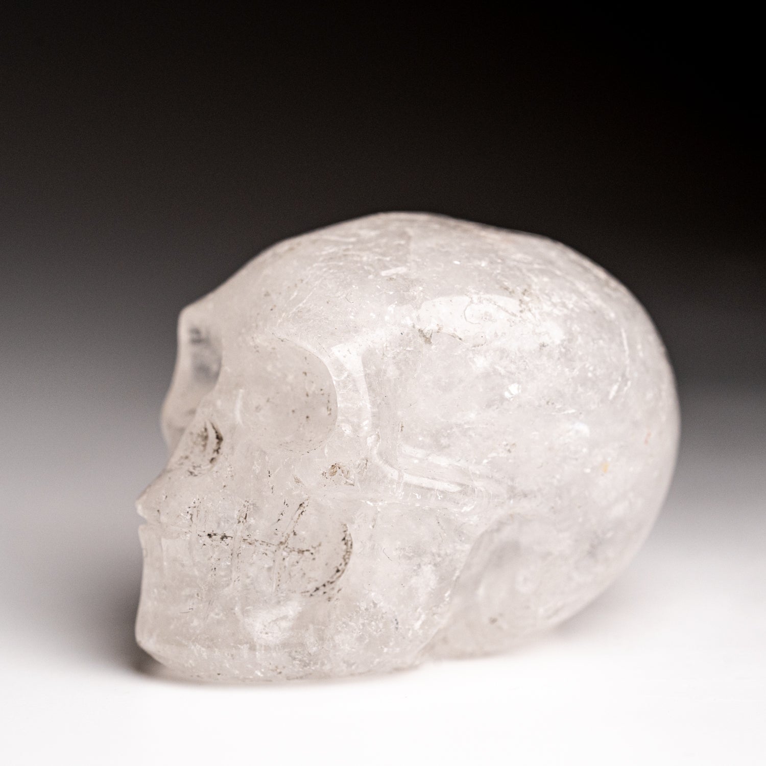 Polished Quartz Skull Carving (129 grams)