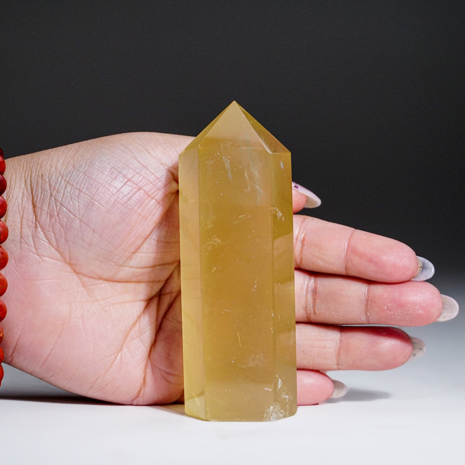 Polished Lemon Quartz Crystal Point from Brazil (201 grams)