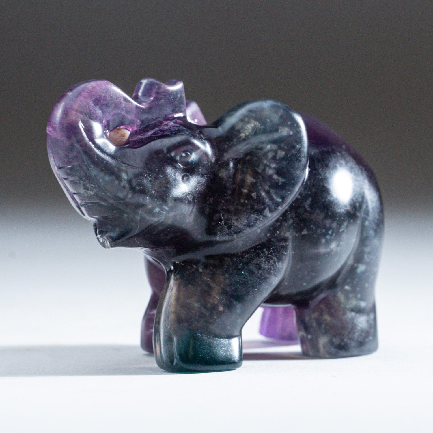 Genuine Purple Rainbow Fluorite Elephant Carving (193.9 grams)
