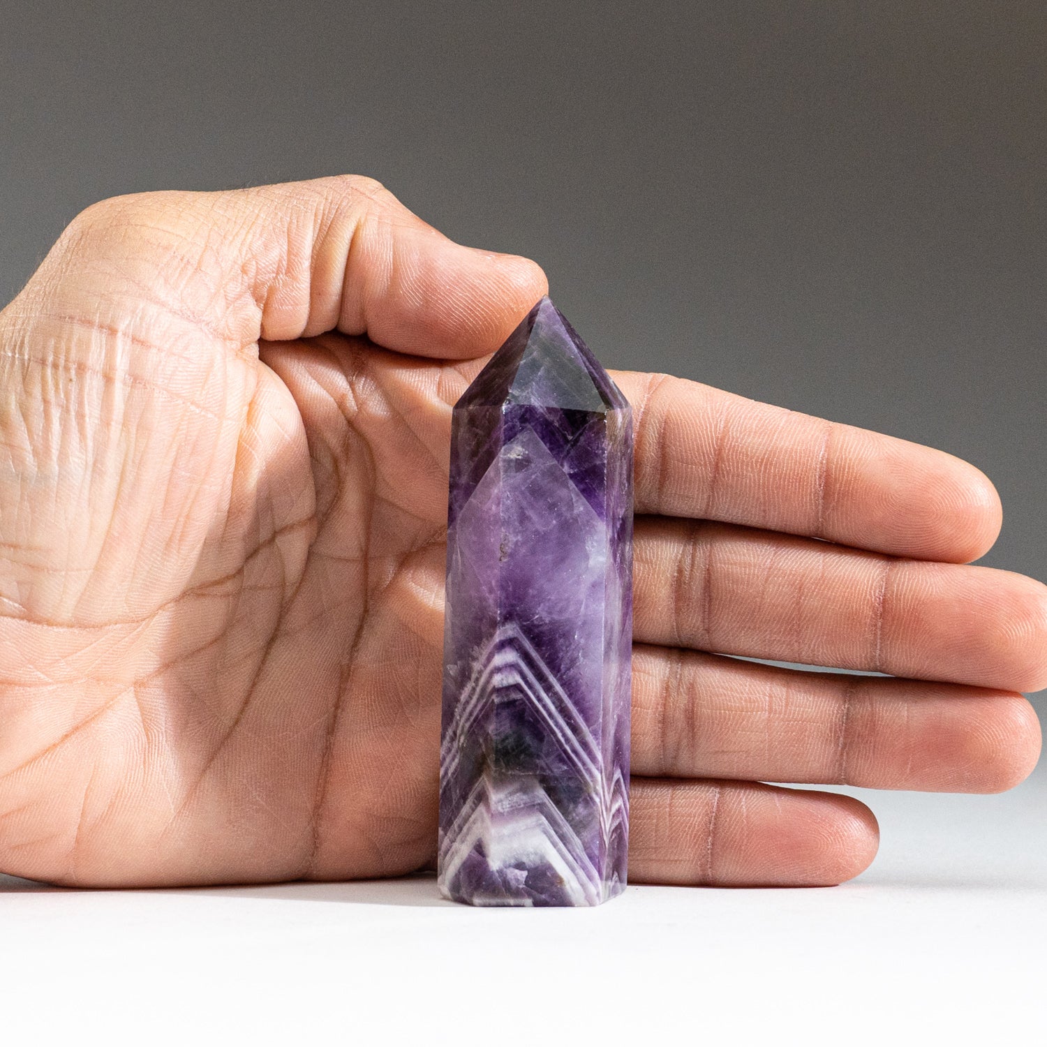 Polished Chevron Amethyst Point from Brazil (105.3 grams)