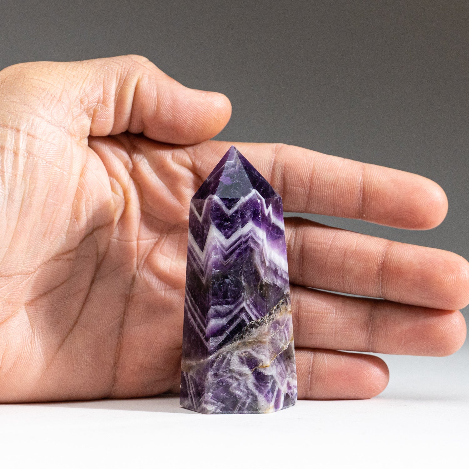 Polished Chevron Amethyst Point from Brazil (113.6 grams)
