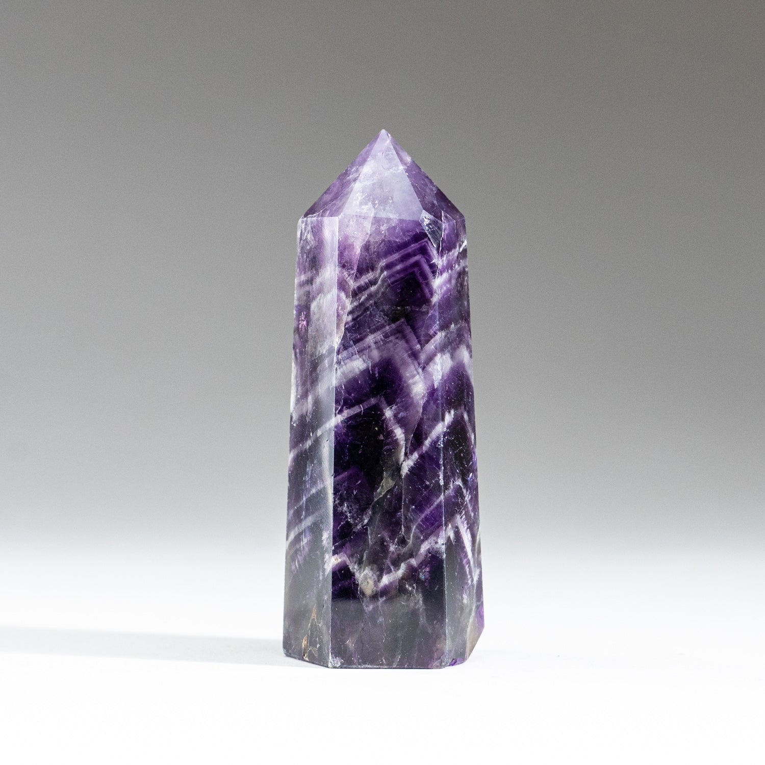 Polished Chevron Amethyst Point from Brazil (132.6 grams)