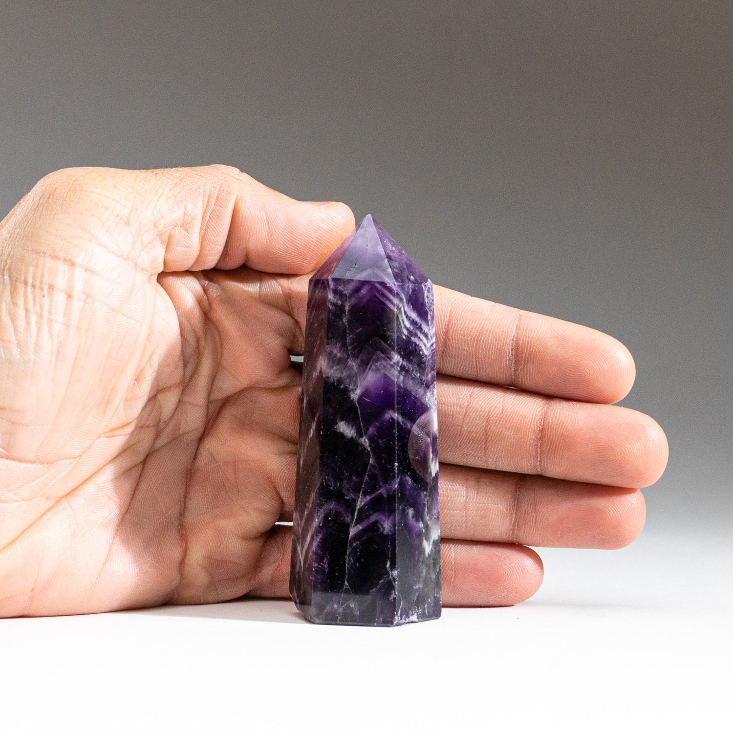 Polished Chevron Amethyst Point from Brazil (132.6 grams)