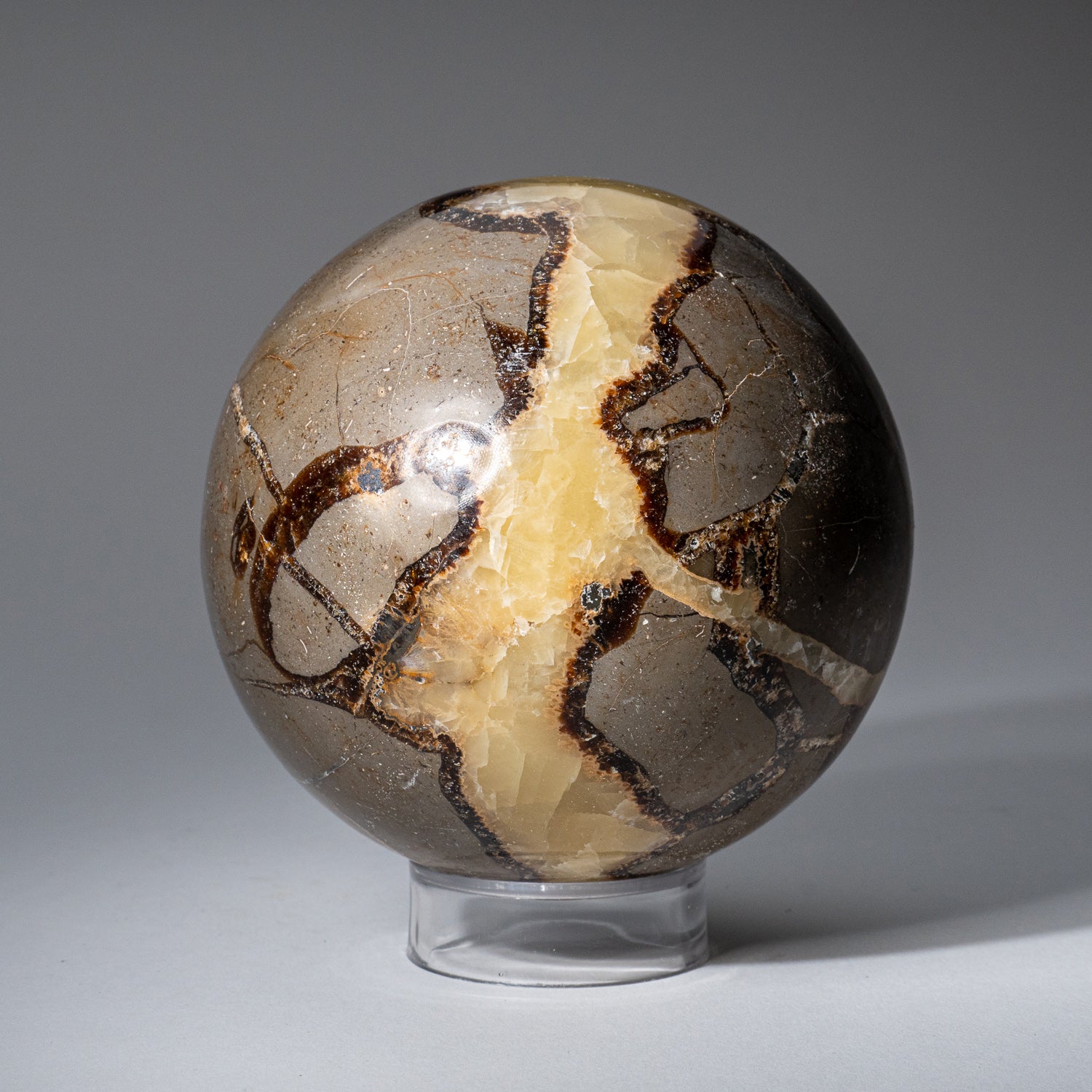 Genuine Polished Septarian Sphere from Madagascar (3.4 lbs)