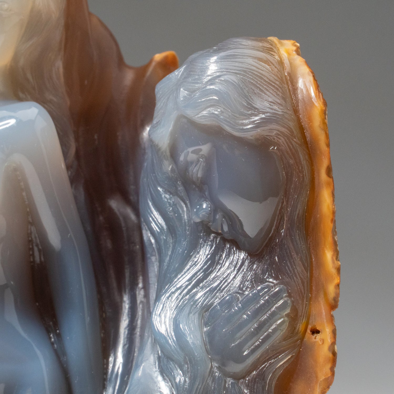 Polished Hand Carved Imperial Blue-Gray Chalcedony Bust and Profile on a Custom Obsidian Base